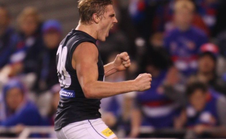 Tom Bell of the Blues celebrates after kicking a goal during the round 17 AFL match between the Western Bulldogs and the Carlton Blues. Tom Bell of the Blues celebrates after kicking a goal during the round 17 AFL match between the Western Bulldogs and the Carlton Blues.